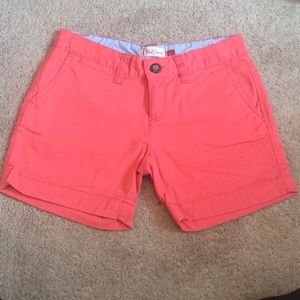 red camel shorts.